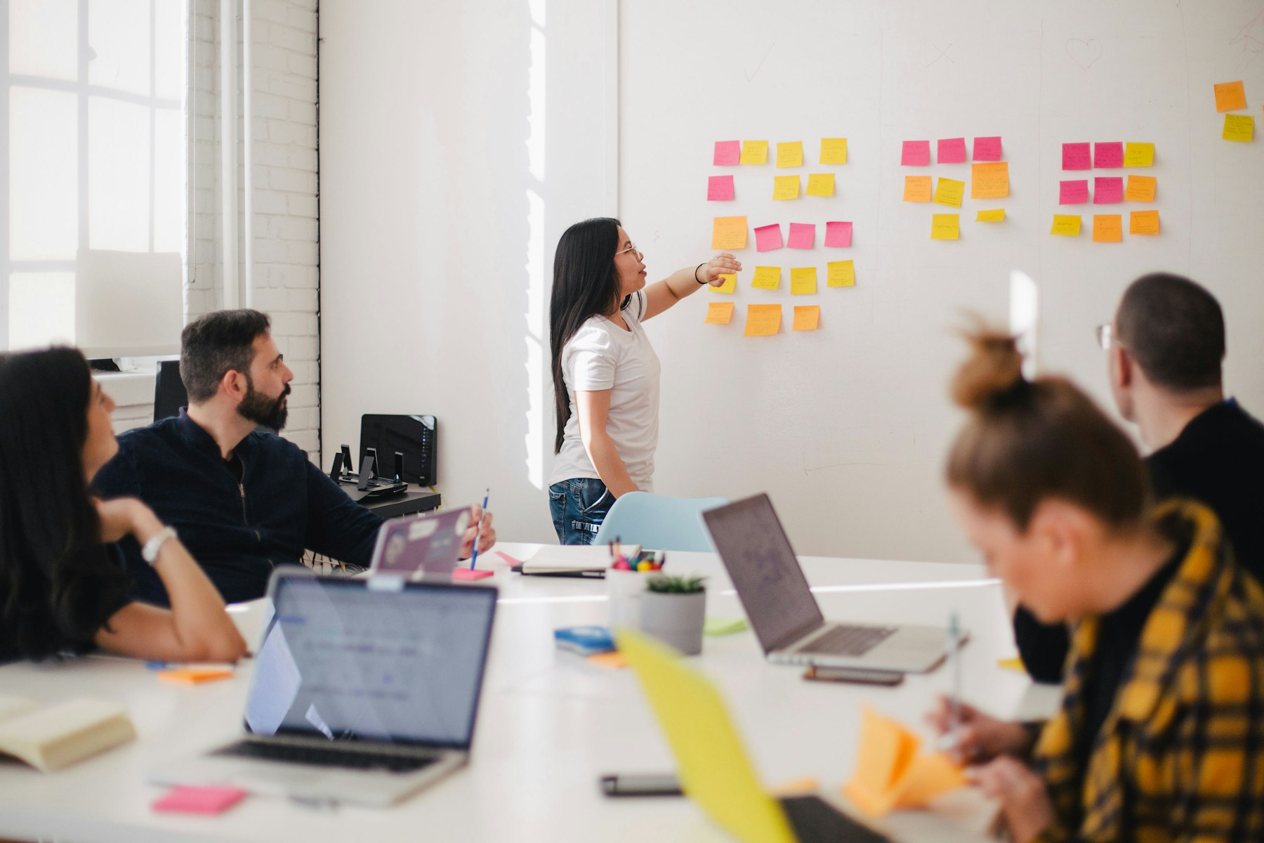 A team working together around a table.